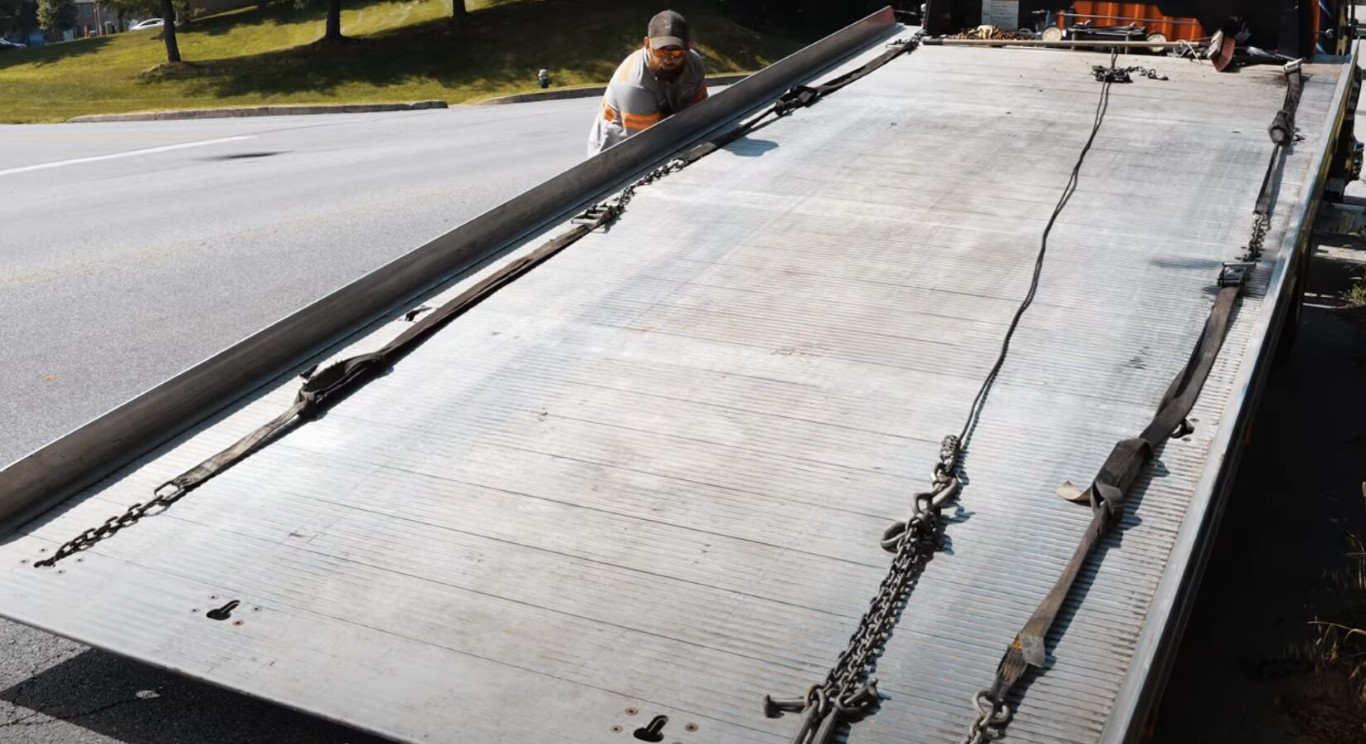 Flatbed tow truck ready for safe vehicle transport